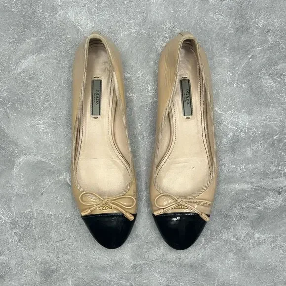 Prada Beige Black Leather Ballet Flats Slip On Size 39.5 Bow Accent Cap Toe